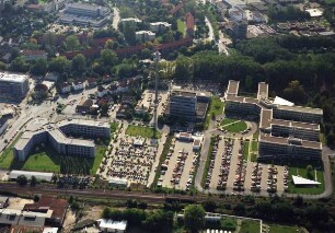 Luftaufnahmen vom Fernmeldeamt. Detmold. Baubeginn 28.3.1989. Grundsteinlegung 25.10.1989. Richtfest 12.12.1990. Schlüsselübergabe 29.10.1992