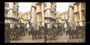 Droschken und Stadttor am Corso Umberto, Messina