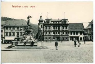 Tetschen. Markt mit Elbebrunnen (1907; Rudolf Weyr) und Hotel Stadt Prag gegen Kirche St. Wenzel und St. Blasius (1778)
