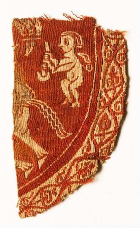 Fragment eines runden oder ovalen Zierstückes