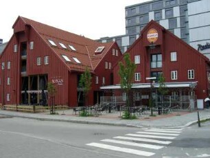 Tromsö: Alte Holzhäuser (Handelshäuser) am Hafen (modernisiert)