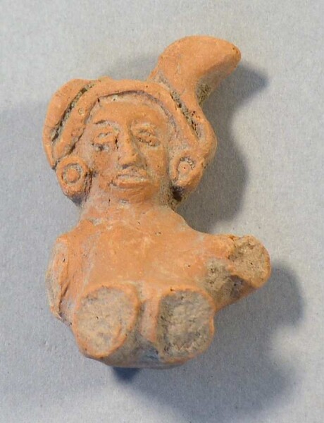 Upper body with head of a clay figure