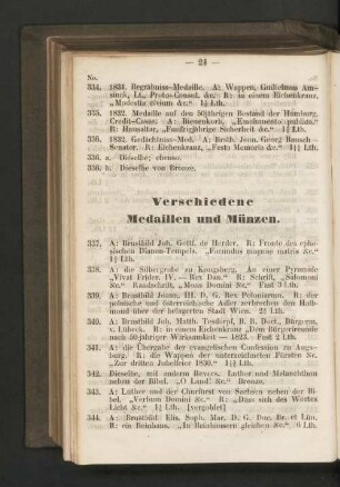 Verschiedene Medaillen und Münzen