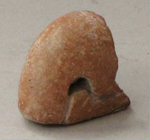 Figurine en argile (fragment de récipient)