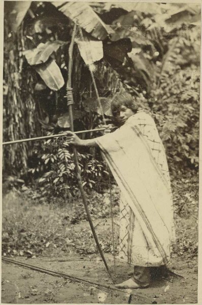 Piro Indian shooting a bow