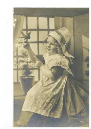 Mädchen mit Haube und Vogel