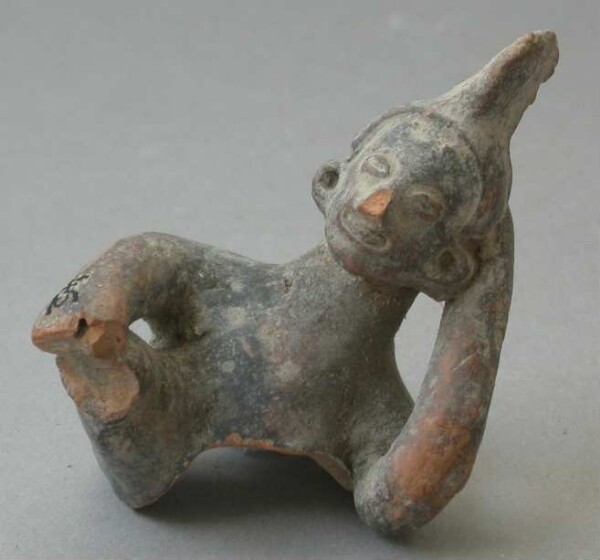 Fragment of a clay rattle (clay head)