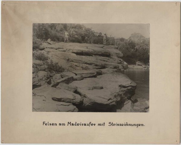 Rocks on the Madeiran shore with stone carvings