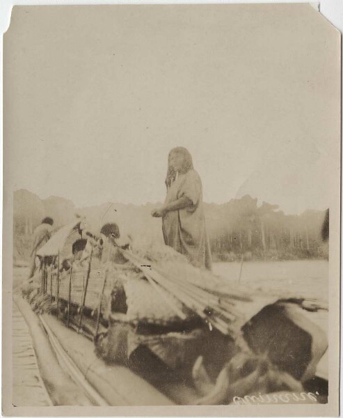 Chimane family travelling with all their belongings