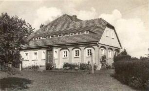 Umgebindehaus in Cunewalde : Chěža ze stołom w Kumwałdźe