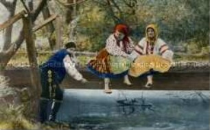 Frauen und junger Mann in ukrainischer Volkstracht