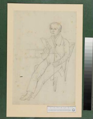 sitzender junger Mann mit Buch und langer Pfeife