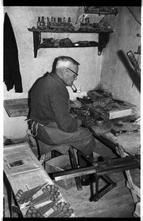 Tonpfeifenbäcker bei der Arbeit