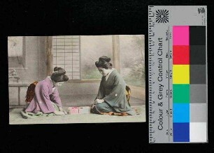 Drei japanische Frauen beim Essen machen/lesen