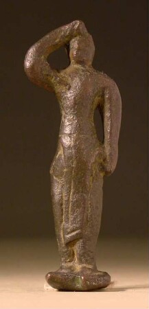 Minoische Statuette eines stehenden gegürteten Mannes