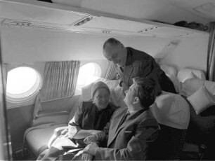 Passagiere an Bord eines Flugzeuges