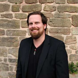 Tobias John