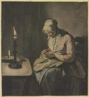 Frau im Kerzenschein bei der Handarbeit