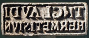 Rechteckiger Stempel mit lateinischer Inschrift: T . CLAVDI / HERMETIS IVN