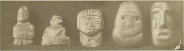 Five anthropomorphic stone figures or heads