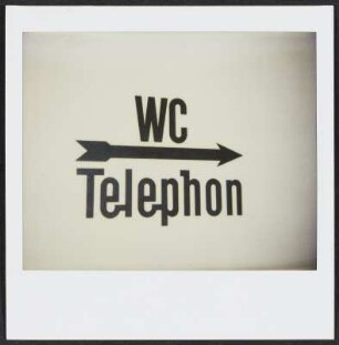 Wegweiser zum WC und Telefon im Wirthaus Galliker in Luzern