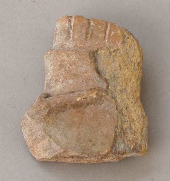 Figurine en argile (fragment)