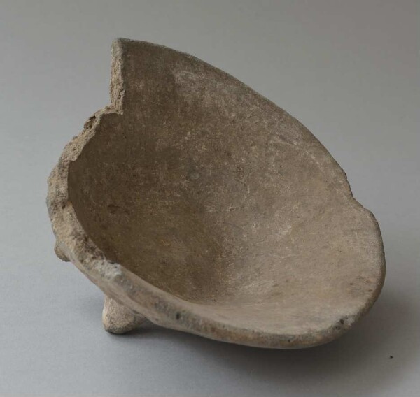 Fragment of a tripod clay bowl