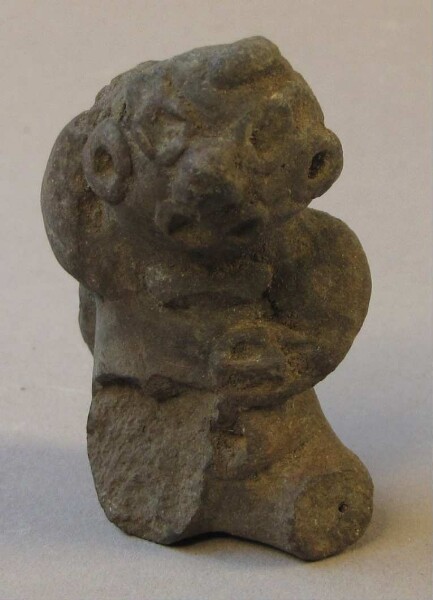 Upper body with head of a clay figure