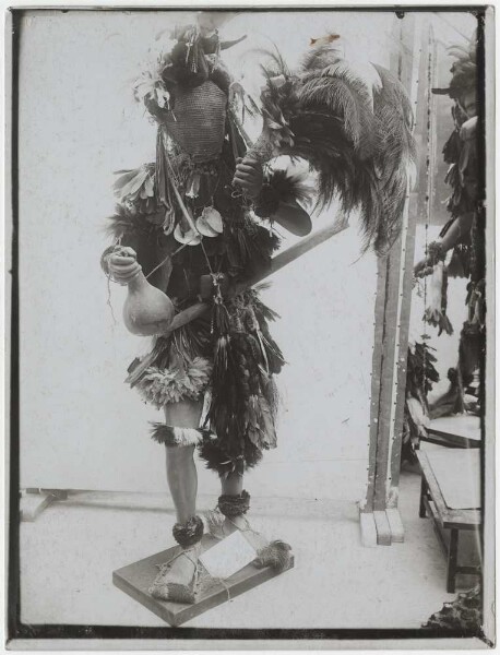 Exhibition mannequin decorated with Chamacoco objects ("Wuiah mask")