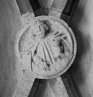Schlußstein mit heiligem Johannes Evangelista