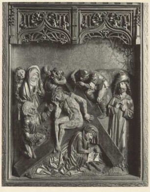 Christus auf dem Kreuz sitzend