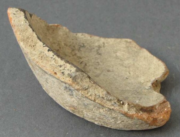 Fragment of a clay vessel