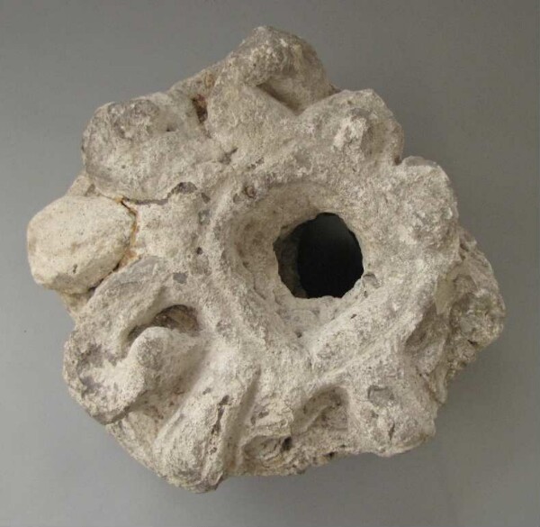 Stone rosette (stucco fragment)