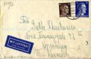 Kuvert eines Briefes aus Berlin nach Kopenhagen mit Marken und Stempeln