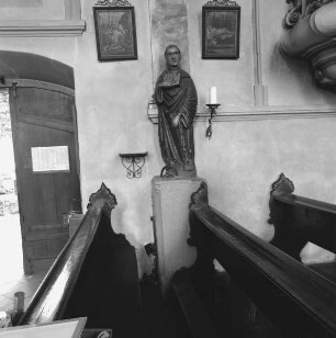 Opferstock mit Figur des heiligen Leonhard