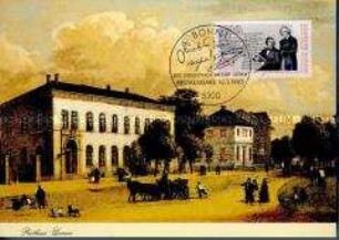 Ersttagspostkarte mit Sonderstempel und Sonderbriefmarke zum 200. Geburtstag der Gebrüder Grimm mit Ansicht des Posthauses Hanau