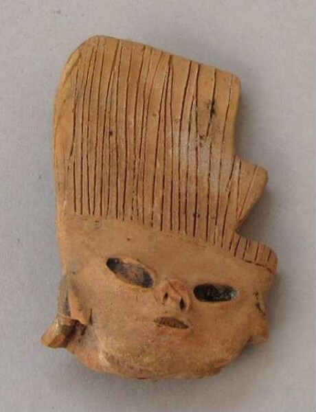 Clay figure (fragment)