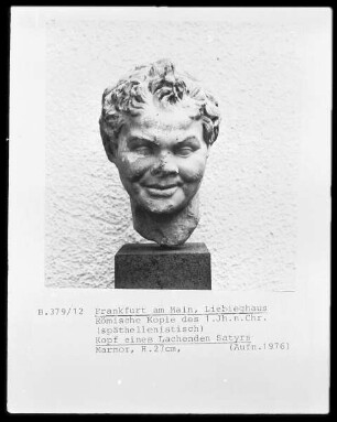 Kopf eines lachendes Satyrs