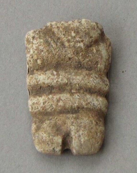 Fragment of a stone figure