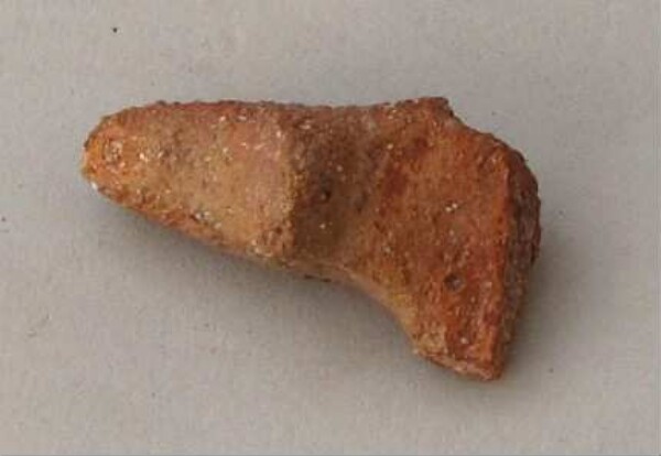 Fragment of a clay vessel