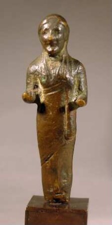 Archaische Statuette eines Mannes im Mantel