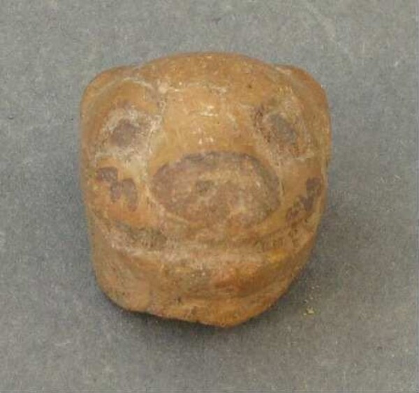 Clay vessel (animal head, fragment)