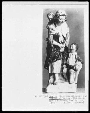 Bettlerin mit zwei Kindern