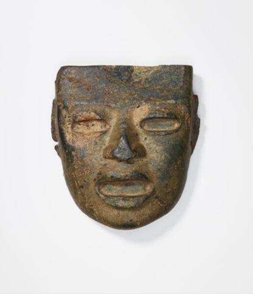 Greenstone mask, with several holes at the edges