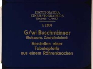 G/wi-Buschmänner (Botswana, Zentralkalahari) - Herstellen einer Tabakspfeife aus einem Röhrenknochen