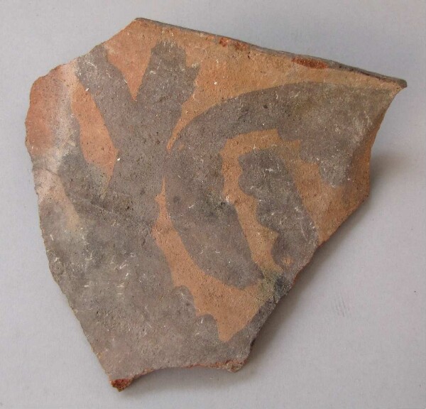 Fragment of a clay vessel