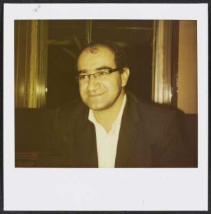 Özcan Mutlu im Adana Grillhaus in Berlin