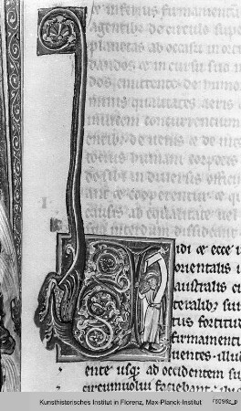 Hildegard von Bingen: Liber divinorum operum : Buchseite mit Text und historisierter Initiale V(idi), bestehend aus einem ornamentalen Drachen, in Ranken verschlungenen Tieren sowie einer Figur mit Schriftrolle