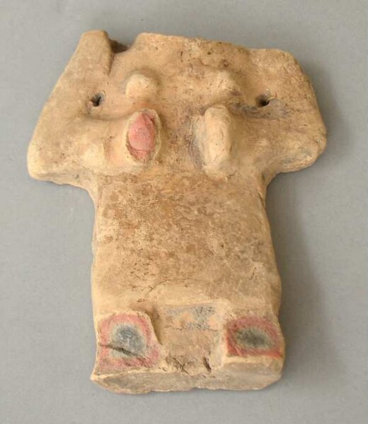 Torso of a clay figure