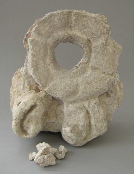 Stone rosette (stucco fragment)